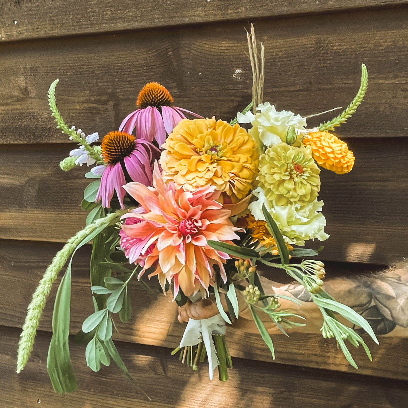 Bouquet against wood wall